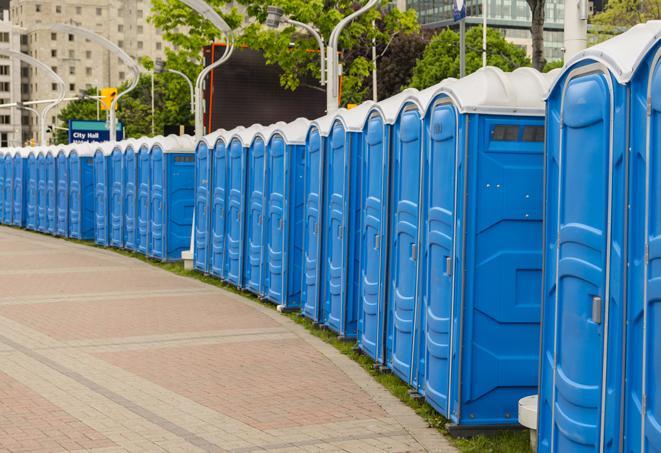 portable restrooms lined up at a marathon, ensuring runners can take a much-needed bathroom break in Cudahy